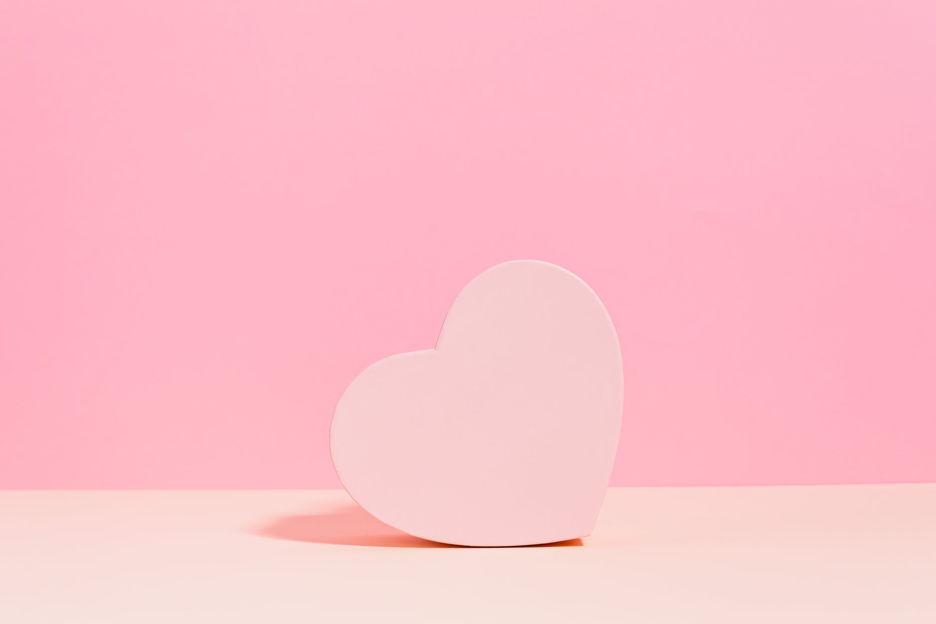 pink heart on studio background
